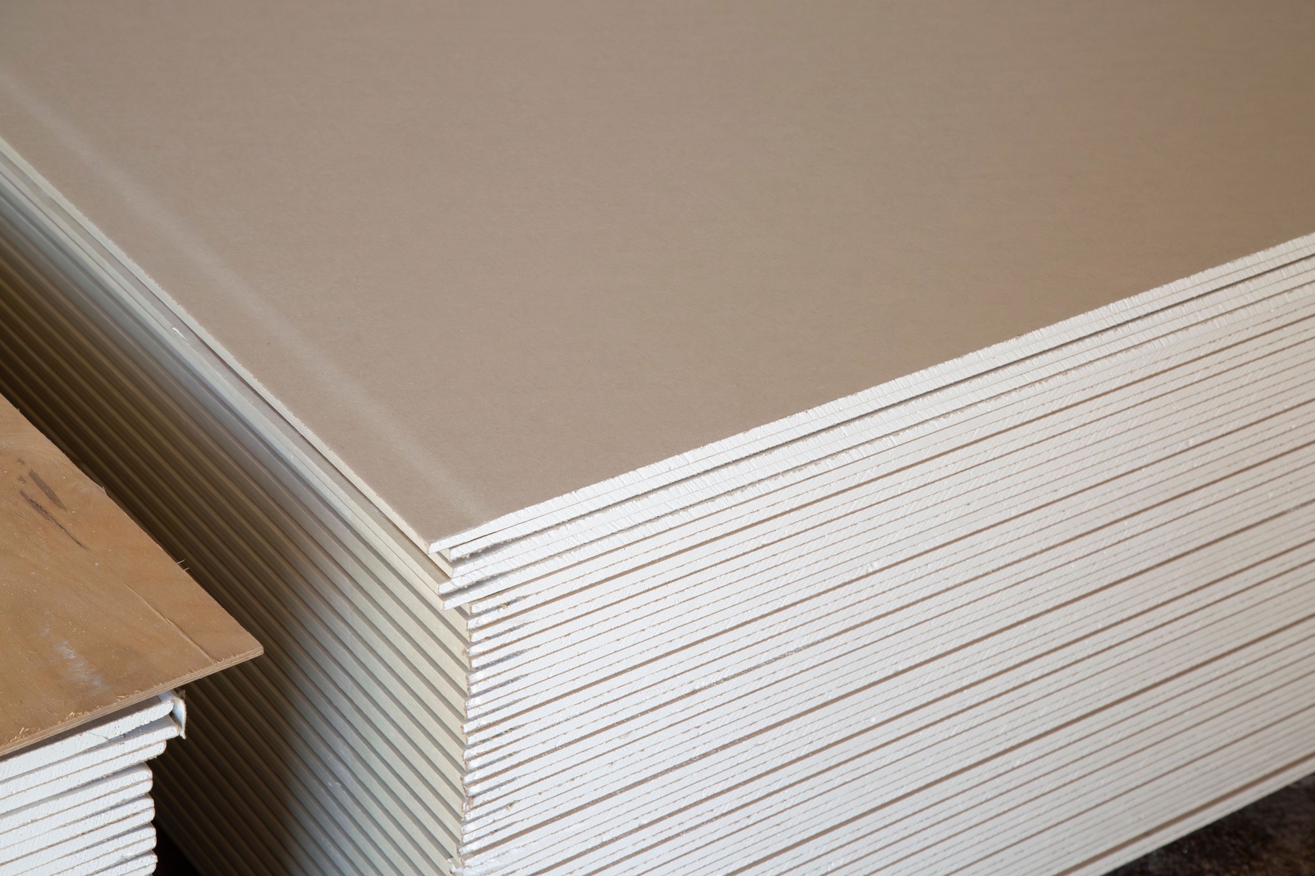Drywall on a white background. Construction material for repairs